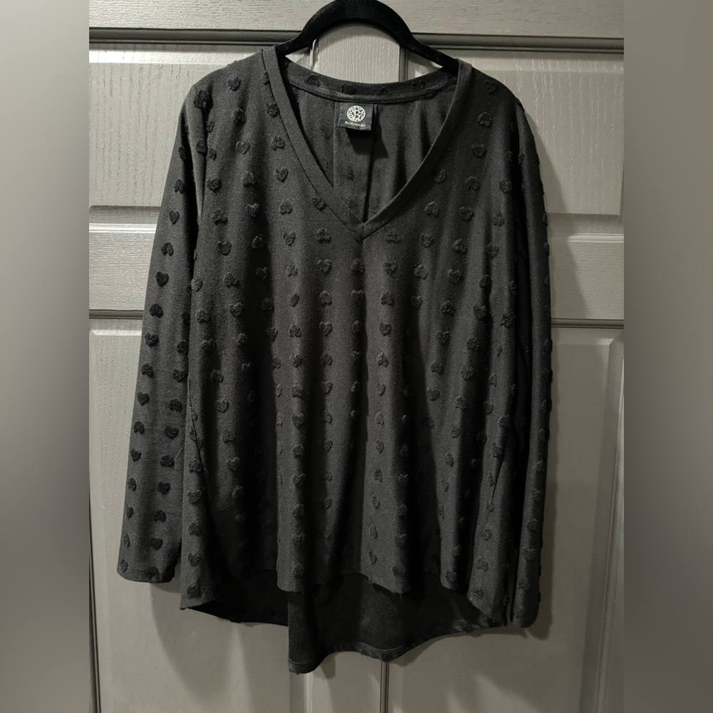 Black long sleeve top with fuzzy black hearts